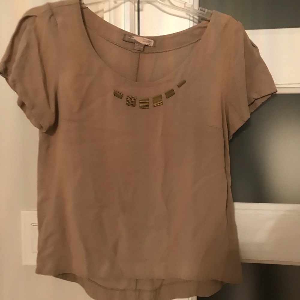 tan blouse
